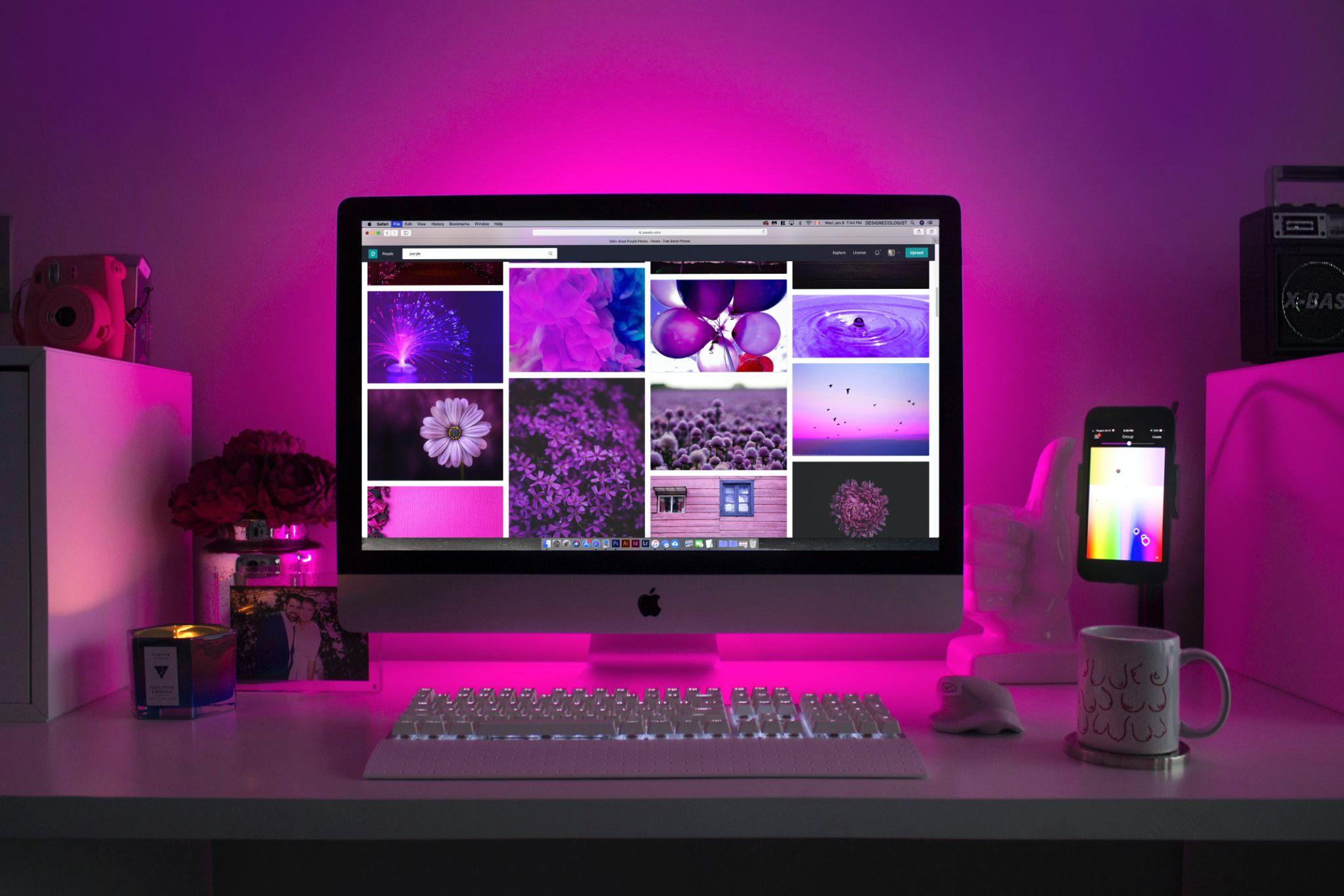 Mac desktop with purple backlight